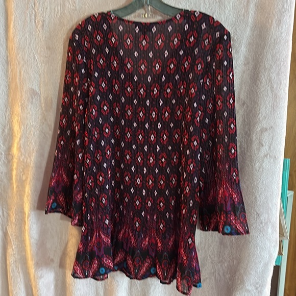 Red Patterned Top with Beaded Neckline. 3/4 length flared sleeves and flared hem - Picture 2 of 7